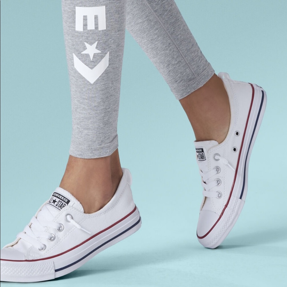 Synched white converse shoes
